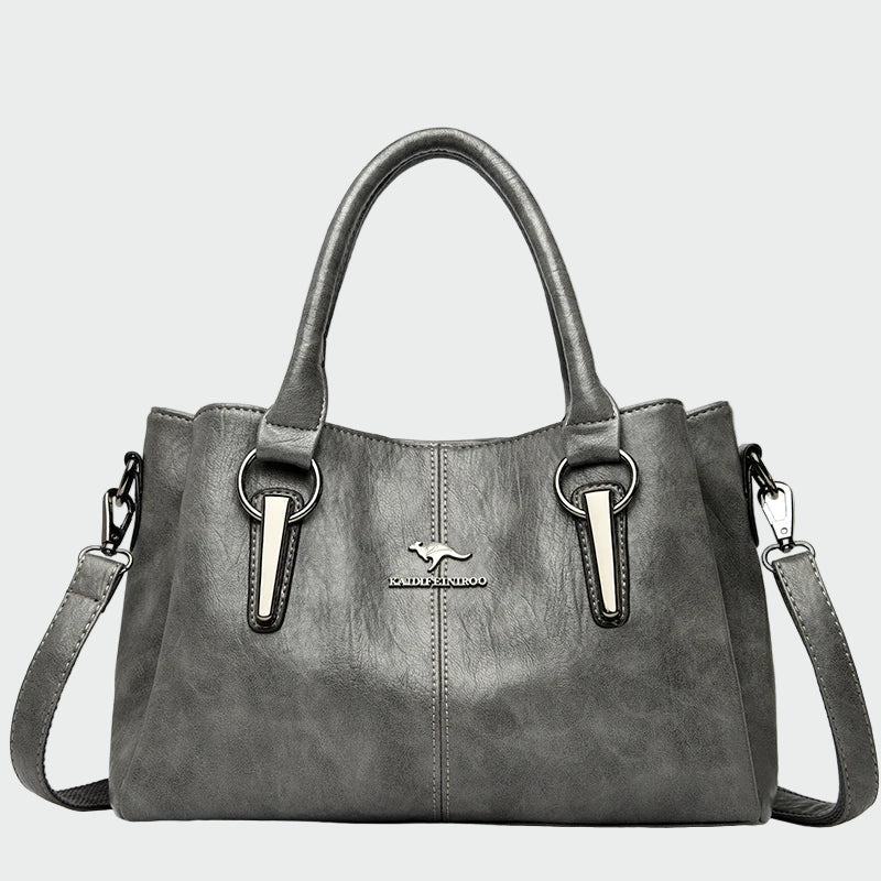 Bolsa de ombro elegante e intemporal