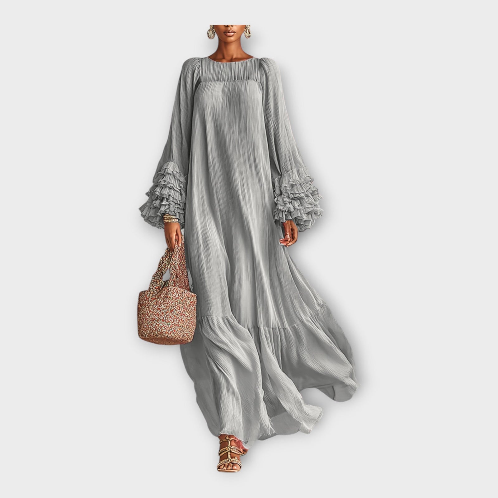 Vestido longo arejado com detalhes elegantes